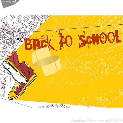 Image of Shoes hanging on wire background. Back to school