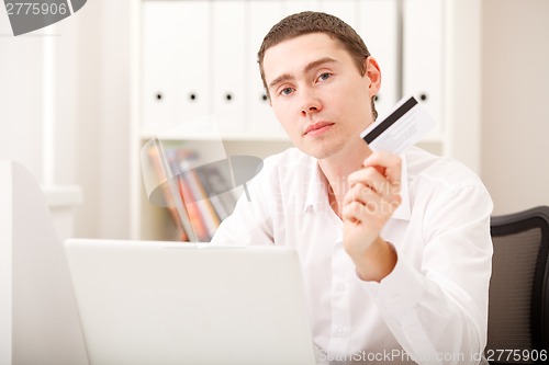 Image of man with credit card