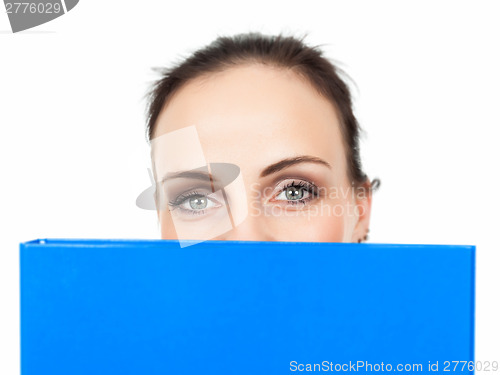Image of business woman with a blue binder