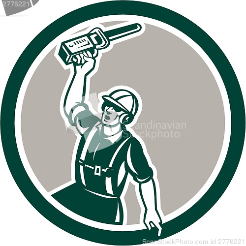 Image of Arborist Holding Up Chainsaw Circle Retro