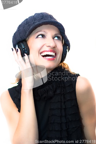 Image of Blonde lady listening to the music.