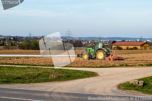 Image of Tractor plowing a field