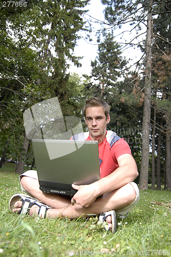 Image of Young man with notebook