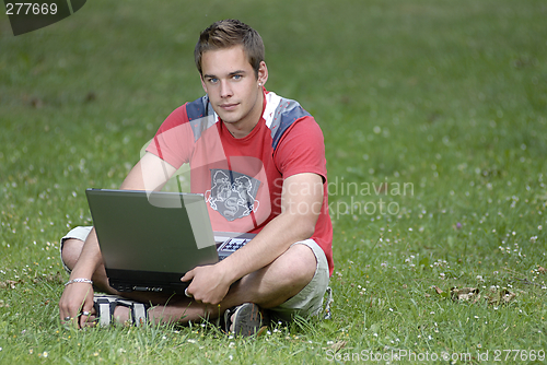 Image of Young man with notebook