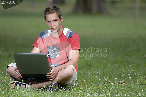 Image of Young man with notebook