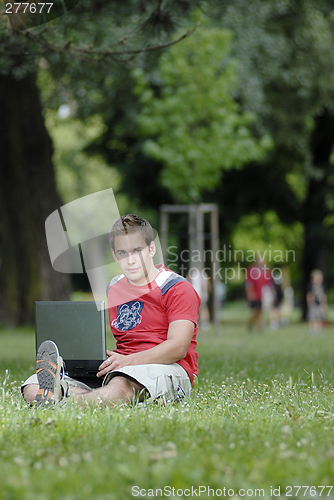 Image of Young man with notebook