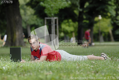 Image of Young man with notebook