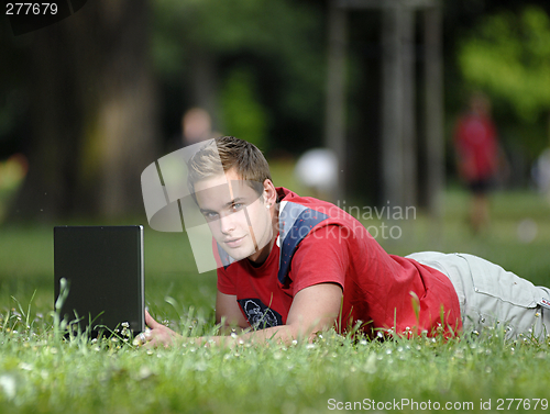 Image of Young man with notebook