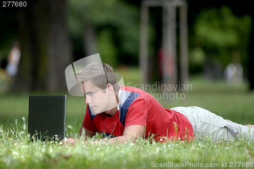 Image of Young man with notebook