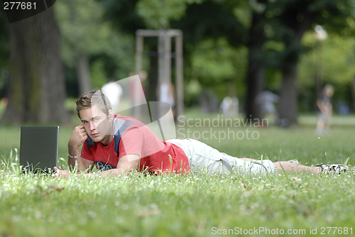 Image of Young man with notebook