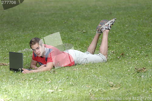 Image of Young man with notebook
