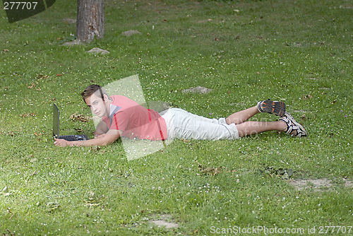 Image of Young man with notebook