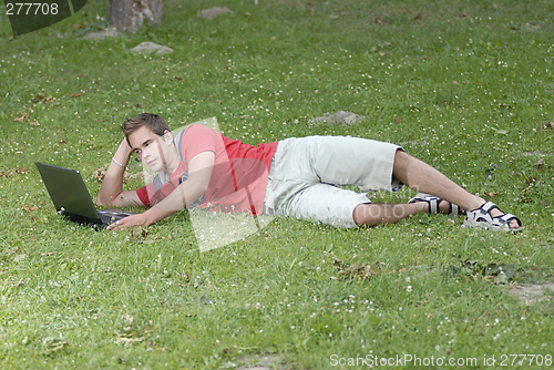 Image of Young man with notebook