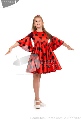 Image of 11 year old girl in a red dress