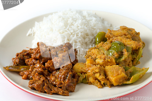 Image of Beef curry with potato and rice