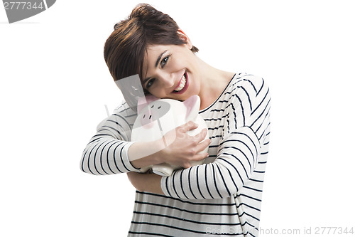 Image of Woman with a piggybank