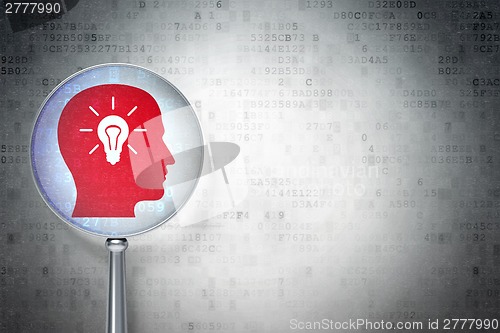 Image of Data concept:  Head With Light Bulb with optical glass on digital background
