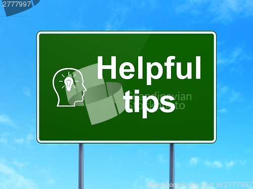 Image of Education concept: Helpful Tips and Head With Lightbulb on road sign background