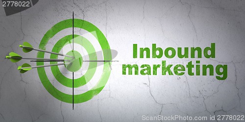 Image of Business concept: target and Inbound Marketing on wall background