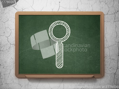 Image of Web development concept: Search on chalkboard background