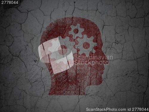 Image of Education concept: Head With Gears on grunge wall background