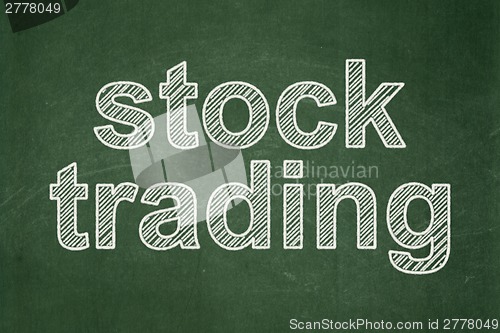 Image of Business concept: Stock Trading on chalkboard background