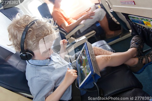 Image of boy in the plane