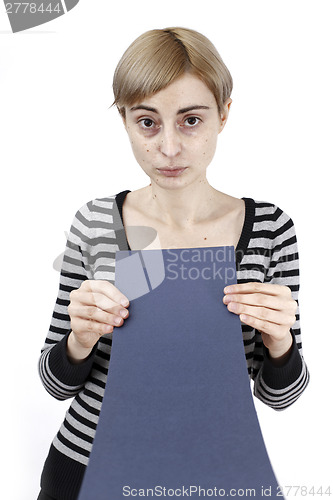 Image of Woman holding a paper