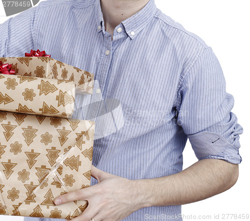 Image of Young man holding a present