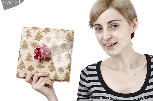 Image of Young woman holding a present