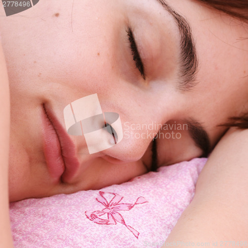Image of Beautiful young woman sleeping.
