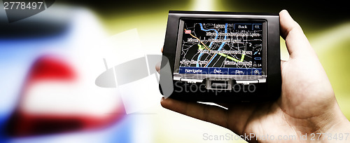 Image of Gps in a man hand.