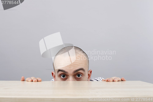 Image of Man at desk