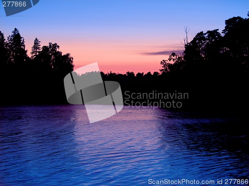 Image of Sunset over water