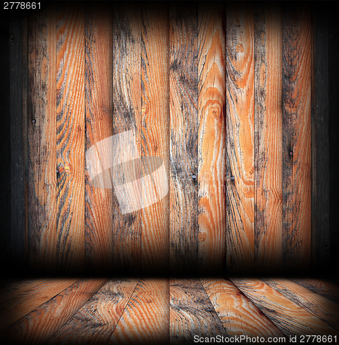 Image of grungy wood surfaces on wall and floor