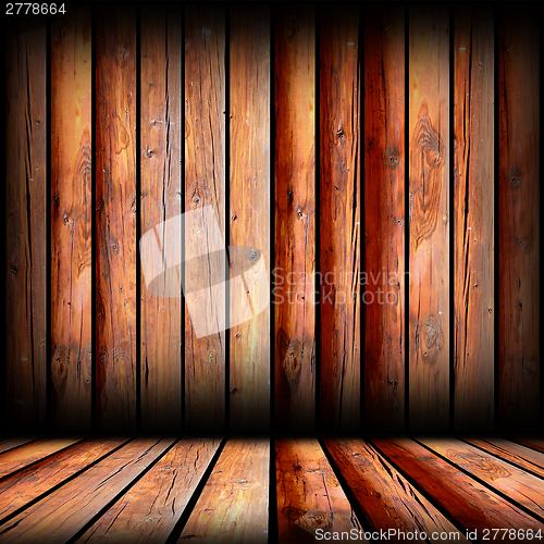 Image of reddish boards on indoor backdrop