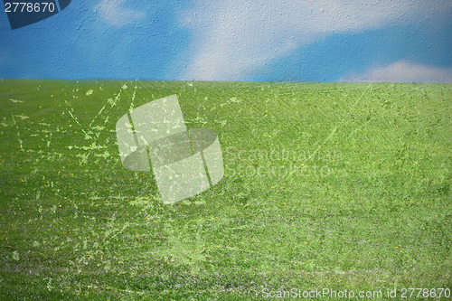 Image of green meadow with  scratched layer