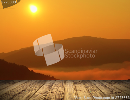 Image of sunrise view from wooden terrace