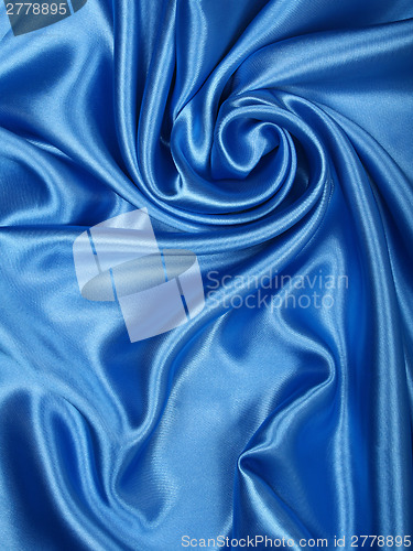 Image of Smooth elegant blue silk as background 