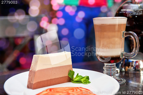 Image of tasty cake with coffee cup