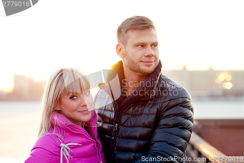 Image of Woman in lovely mittens and her boyfriend