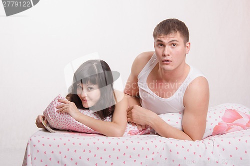 Image of Wife hides from her husband money under the pillow