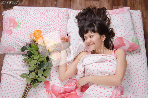 Image of Young beautiful girl woke up on his birthday