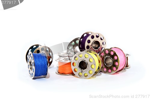 Image of Pile of colorful thread spools