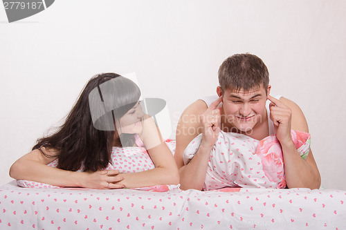 Image of Normal quarrel in bed husband and wife