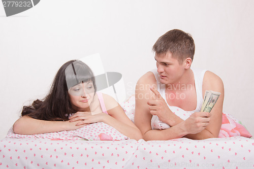 Image of Husband gives his wife a salary