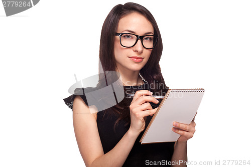 Image of University student in glasses with notepad