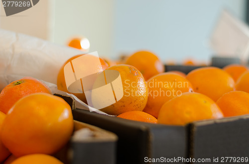 Image of close up of orange orange in box 