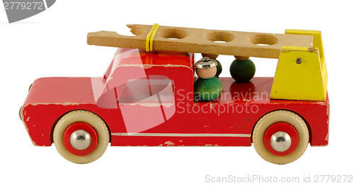 Image of antique wooden fire-engine  toy isoalted on white  