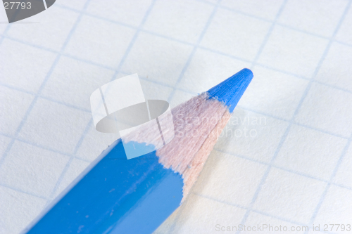 Image of Blue pencil on notepad